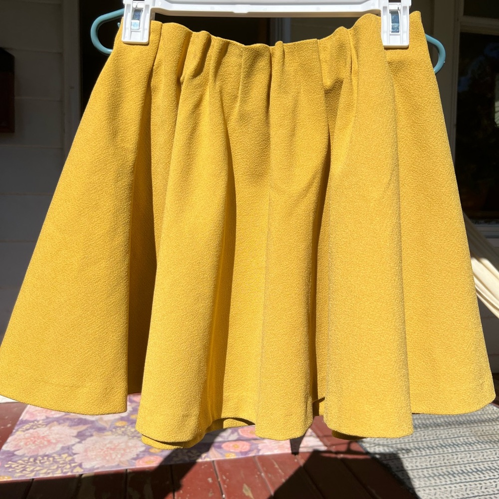 H&M mustard color skirt.